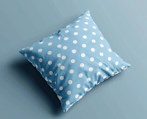 A blue cushion with white polka dots lies on a matching blue surface