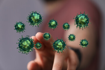 An artistic representation of microscopic Coronavirus cells and the human hand, depicting spread and healthcar