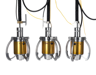 Three metallic claw machines suspended by wires against a black background