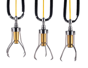 Three mechanical robotic arms with open claws and gold cylindrical bodies, black background