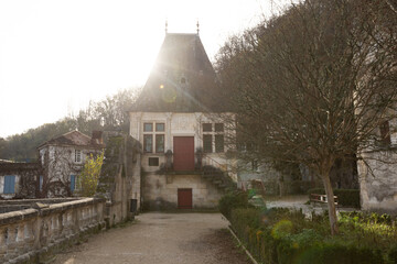 Obraz premium Buildings small vineyard on the Dronne River, Brantome, Brantome-en-Perigord, France