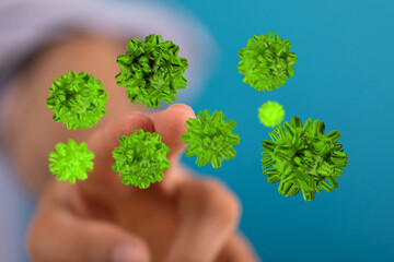 Conceptual image of hand interacting with viruses. A digital representation of illness, infection, and medical