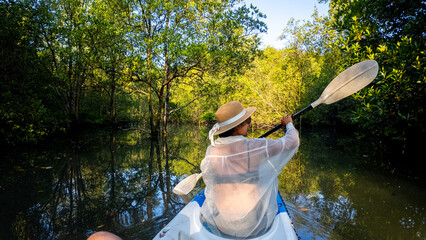 Explore the serene mangrove waterways of Koh Phayam Island, Thailand, in a kayak