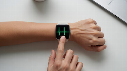 Person interacts with smartwatch displaying heart rate monitor. device shows electrocardiogram ECG reading, indicating health monitoring features. setting is modern and tech oriented