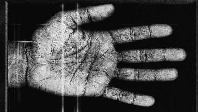 Grunge texture of a scanned human palm with photocopy effect and scratches.