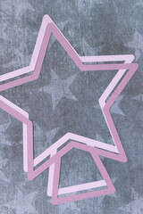 machine-cut paper cutouts of stars on scrapbooking paper with stars