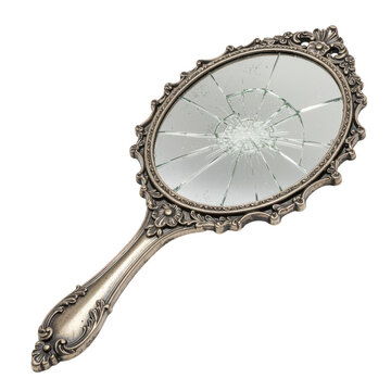 Antique handheld mirror with cracked glass