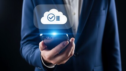 Businessman using smartphone with cloud computing icon for data storage and security