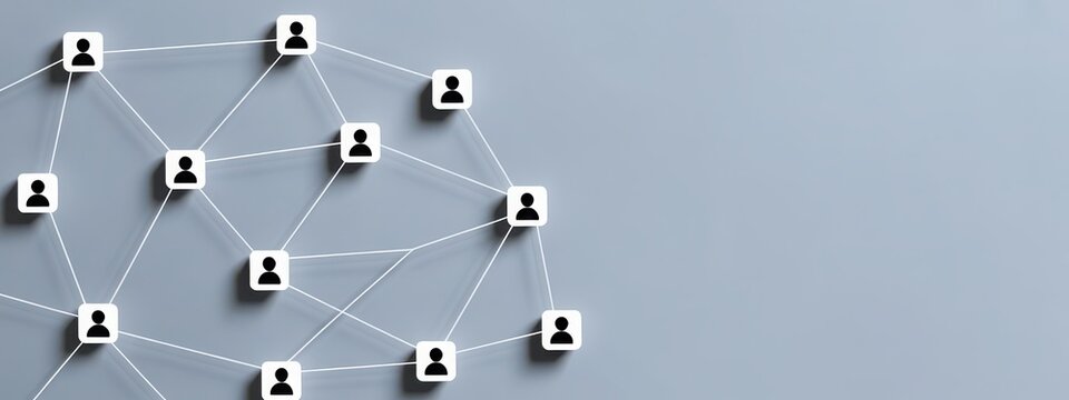 Network of connected people icons on a plain grey background, representing social connections and teamwork - Powered by Adobe