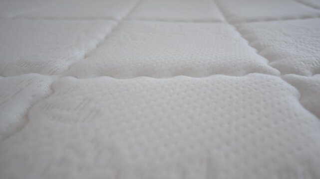Close look at a mattress fabric with detailed texture