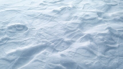 Obraz premium Snowy landscape with textured surface viewed from above