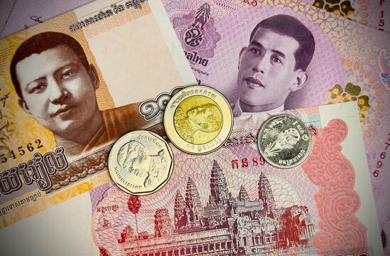 close up of Thailand baht and Cambodia riel