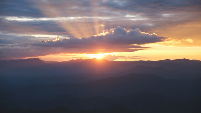 Landscape image of mountains view and sunset sky on cloudy day - Powered by Adobe