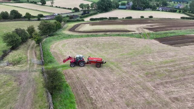 Aerial drone view of Massey Ferguson 4255 tractor and front loader with an Abbey manure slurry spreader 10-10-2025 