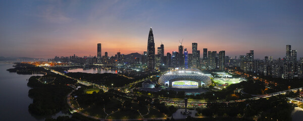 Fototapeta premium Aerial shot of the night view of Talent Park at China Resources Building, Nanshan District, Shenzhen
