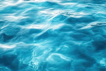 Fototapeta premium calm turquoise water surface with gentle ripples and shimmering sunlight reflections, serene and soothing