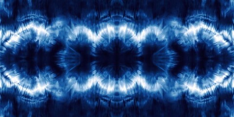 soothing indigo tie-dye textile with symmetrical circular bursts, rippled white highlights and watercolor-like radial textures