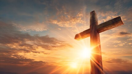 Cross against a sunset sky symbolizing faith and hope.