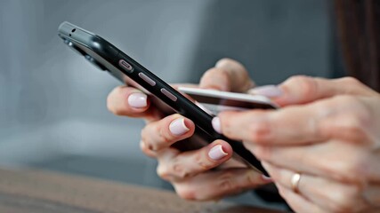 Close up of hands holding smartphone and credit card, online payment process, digital transaction, ecommerce and modern cashless financial technology concept - Powered by Adobe
