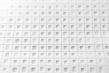 Minimal white tiled surface with repeating recessed square grid, soft shadows and calm geometric abstract texture