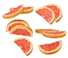 several vibrant grapefruit segments arranged artfully, emphasizing freshness and natural appeal for use in health, food, and citrus-themed photographic projects
