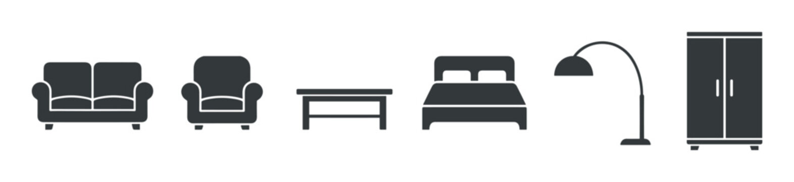 Collection of dark gray furniture icons featuring a sofa, armchair, table, bed, floor lamp, and wardrobe in a minimalist glyph style for interior design concepts