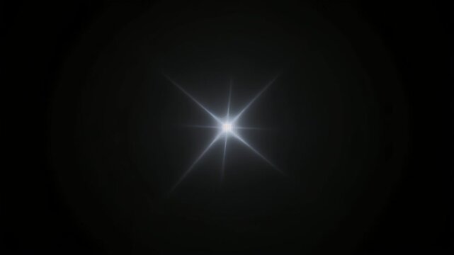 Brilliant digital lens flare creating a starburst effect against a dark background, an abstract light phenomenon perfect for graphic design and atmospheric overlays