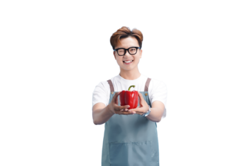 Cheerful Chef Presenting Fresh Red Pepper: A smiling culinary professional, sporting glasses and apron, extends a vibrant red pepper with genuine enthusiasm.