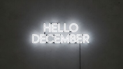 Illuminated Neon Sign Reads Hello December Against Dark Wall.