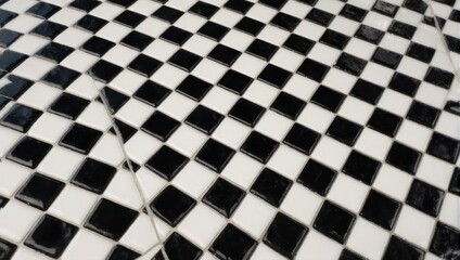Obraz premium Black and white checkered tile pattern, glossy surface, close-up view.