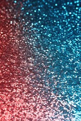 Fototapeta premium Close-up of red and turquoise glittering sequins forming a sparkling gradient with dreamy bokeh and festive reflective texture