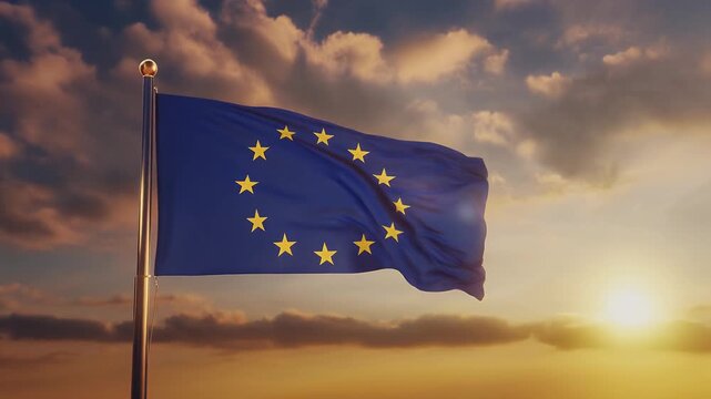 European flag waving in the wind at sunset with cloudy sky