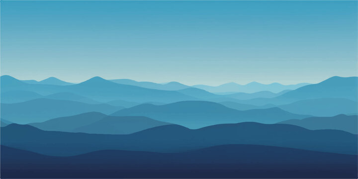 Mountain landscape in the blue morning fog with sun rising over the clouds and mist in the valley
