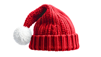 Red knitted christmas hat with white pompom and cuff isolated on transparent background for festive season design