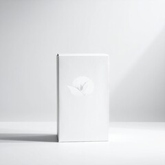 A blank white cardboard box, subtly embossed with a light gray, stylized, floral design, stands on a plain white backdrop