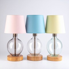 Three small table lamps with colored shades