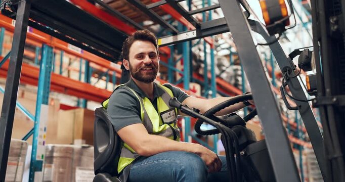 Face, forklift and logistics with man in factory for delivery, distribution or shipping. Smile, supply chain and warehouse with happy person in vehicle depot for inventory management from below