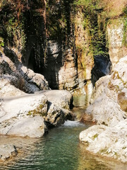 A river with a waterfall in the mountains, Caucasus