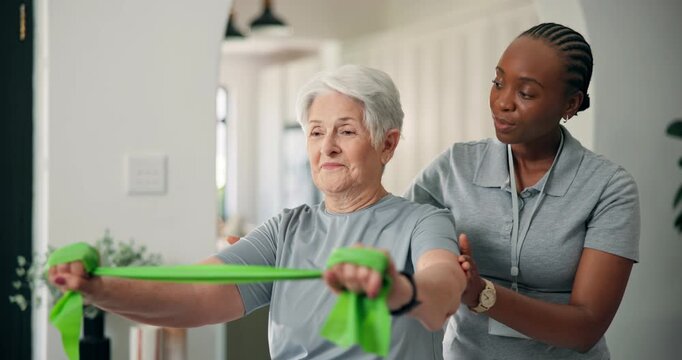 Senior woman, physiotherapist and patient with resistance band for strength training in home. Elderly, female person or physio helping client with flexibility for muscle recovery, fitness or exercise