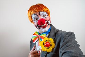 Clown smiling and looking at viewer as selfie