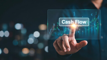 Hand Touching Virtual Display Showing Cash Flow and Financial Growth Charts