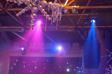 new year party in night club with xmas decoration and snowflakes, background