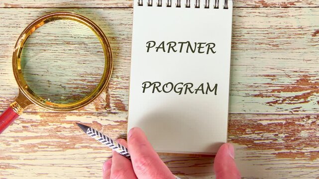 Explore the concepts of a partner program focused on business and finance. Dive into educational content presented through engaging animated text PARTNER PROGRAM that enhances learning