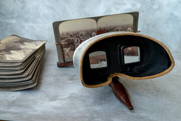 An antique stereoscope for viewing large-scale photos. Watch cardboard stereo pairs.