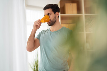 Man drinking morning coffee and having thoughtful moments