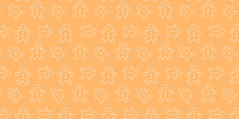 Fototapeta premium Seamless festive pattern featuring charming gingerbread man cookies, some with heart details, on a warm orange background, perfect for holiday season designs and winter celebrations