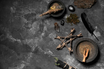 Fototapeta premium Shaman's accessories with herbs and runes on grunge background