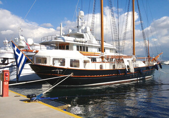 (Vintage style tourist boat docked at Zea Marina, Piraeus values)