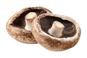 Two mushrooms are shown, one of which is cut in half, isolated on a transparent background