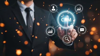 Strategic CRM Optimization: Professional Businessman Touching Customer Relationship Management Icon for Sales Growth